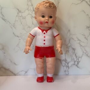 Vintage Sun Rubber Company 1956 rubber squeaker boy doll toy red & white